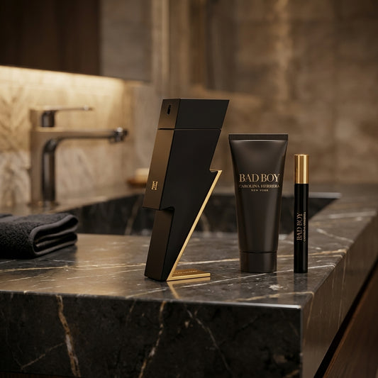 Carolina Herrera Bad Boy fragrance set on luxury bathroom marble vanity