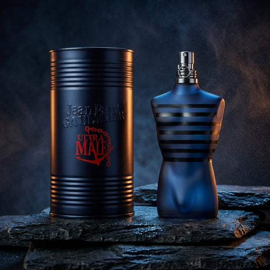 Jean Paul Gaultier Ultra Male Eau de Toilette bottle with collector tin on dark stone podium